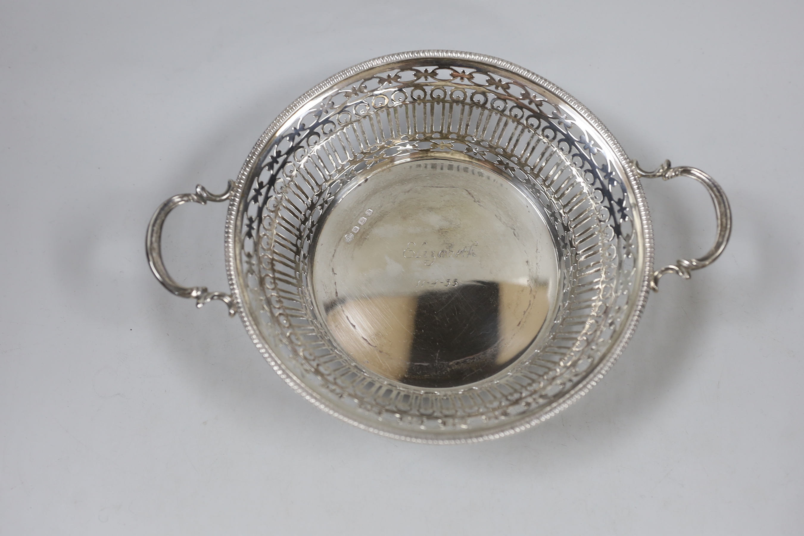 A George V pierced silver two handled bowl, William Hutton & Sons, Sheffield, 1927, 25.2 cm over handles, 9.8oz.